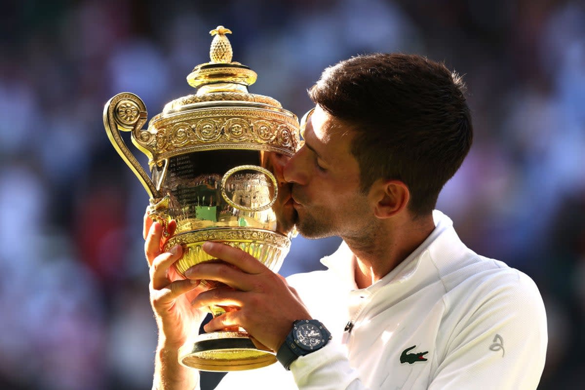 Novak Djokovic celebrates his fourth Wimbledon in a row  (Getty Images)