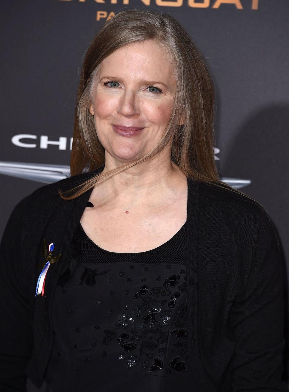 <p>Suzanne Collins was born in Hartford, Connecticut, but as a military brat, she spent most of her childhood moving along the east coast. Her career began not with novels, but as a writer for tv, including some of our Nickelodeon favorites like <em>Clarissa Explains it All</em>, <em>Little Bear</em> and <em>Oswald</em>. She then started writing children's middle-grade books, including the epic fantasy series <em>The Underland Chronicles</em>. She received mainstream success and fame with 2008’s <em>The Hunger Games</em>, which was inspired by the Greek Myth of Theseus and the Minotaur and her father’s own career in the Air Force. </p>