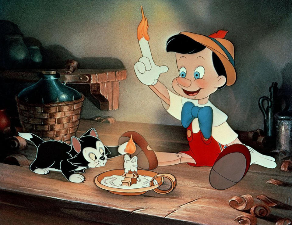 Pinocchio lights his finger on fire in 'Pinocchio' (Photo: Walt Disney/courtesy Everett Collection)