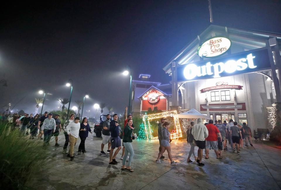 About 250 Black Friday shoppers were waiting in line when Bass Pro Shops opened its doors at 5 a.m. Friday at One Daytona in Daytona Beach. Although lines were shorter at some stores, many shoppers still embrace the traditional pre-dawn retail ritual of Black Friday.