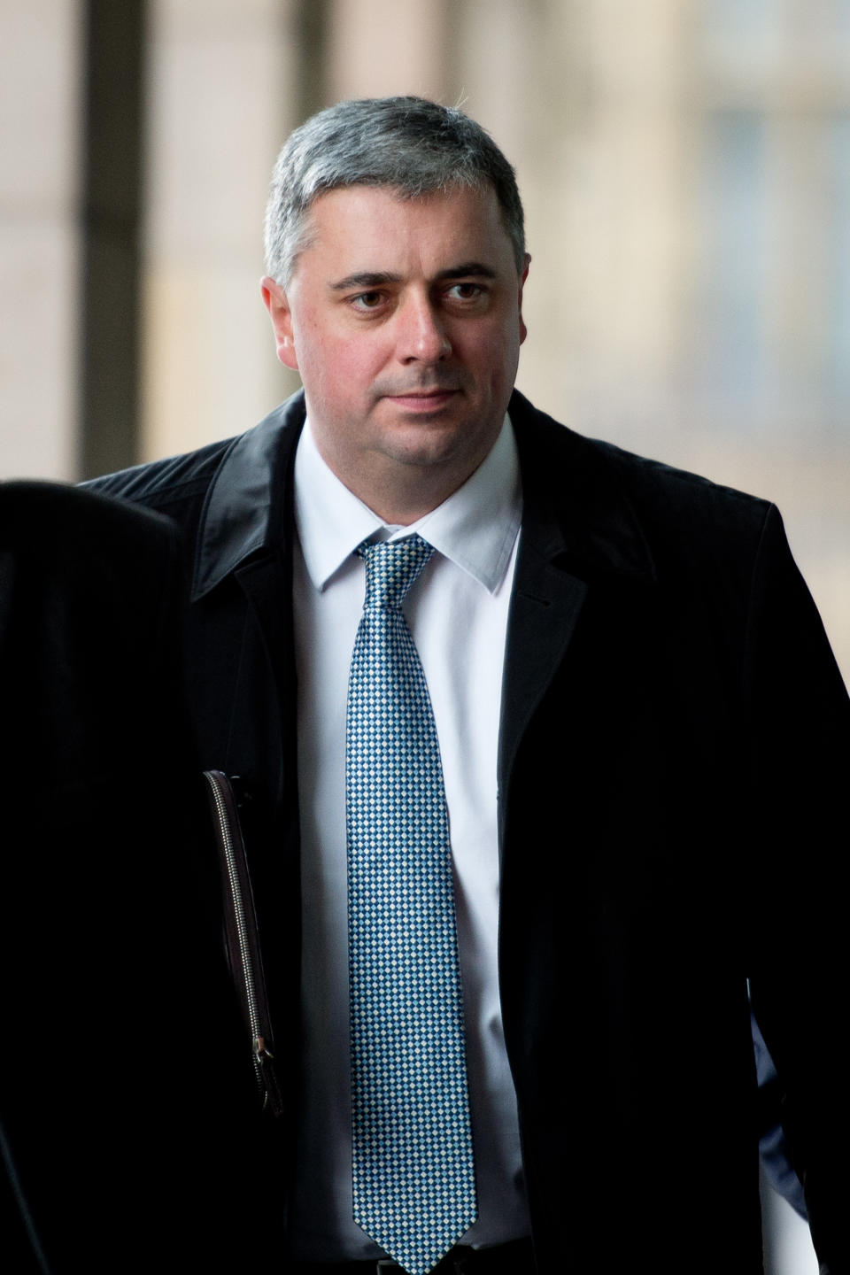 Chief Executive Officer of Gatwick Airport Stewart Wingate arrives at Portcullis House in central London on January 7, 2014 to face questions from the Parliamentary Transport Committee on transport winter resilience following weather disruption to the airport over the Christmas period.  AFP PHOTO / LEON NEAL        (Photo credit should read LEON NEAL/AFP via Getty Images)