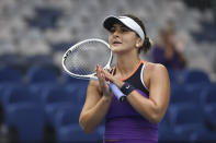 Canada's Bianca Andreescu reacts after defeating compatriot Romania's Mihaela Buzarnescu during their first round match at the Australian Open tennis championship in Melbourne, Australia, Monday, Feb. 8, 2021. (AP Photo/Hamish Blair)