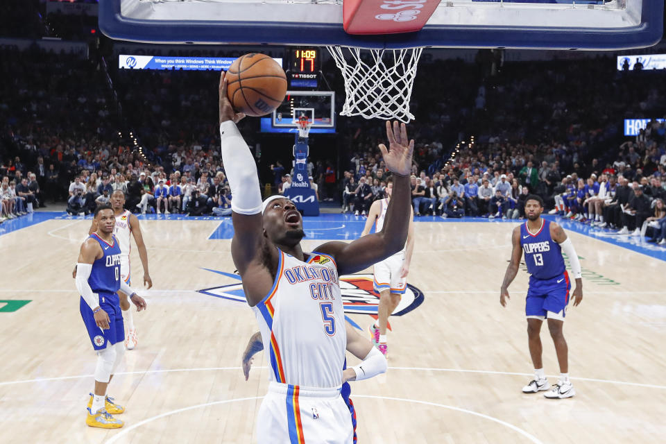 Feb 22, 2024; Oklahoma City, Oklahoma, USA; Oklahoma City Thunder guard Luguentz Dort (5) goes to the basket against the LA Clippers during the second half at Paycom Center. Mandatory Credit: Alonzo Adams-USA TODAY Sports