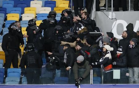 Football Soccer - FC Dynamo Kyiv v Besiktas - UEFA Champions League Group Stage - Group B - NSC Olimpiyskiy Stadium, Kiev, Ukraine - 6/12/16. Besiktas' fans argue with police. REUTERS/Gleb Garanich