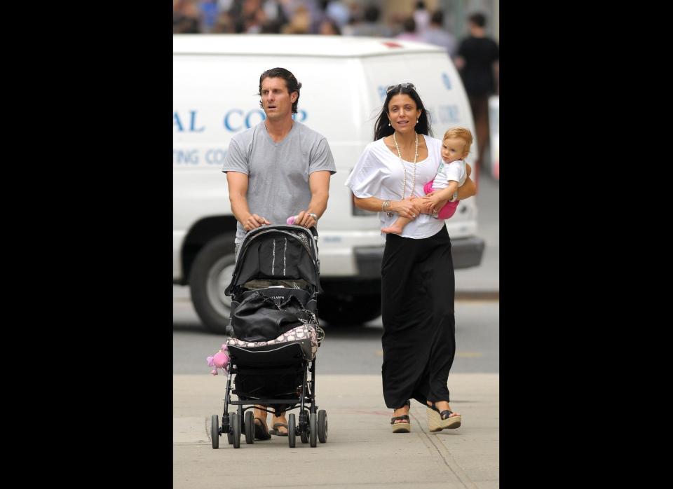 Bethenny Frankel strolls with her husband Jason Hoppy and their daughter Bryn through the West Village in New York City.