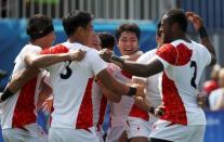 2016 Rio Olympics - Rugby - Preliminary - Men's Pool C New Zealand v Japan - Deodoro Stadium - Rio de Janeiro, Brazil - 09/08/2016. Japan celebrates after defeating New Zealand. REUTERS/Phil Noble