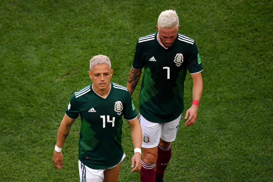 Javier Hernandez and Miguel Layun can’t hide their disappointment after the final whistle. (Hector Vivas/Getty Images)