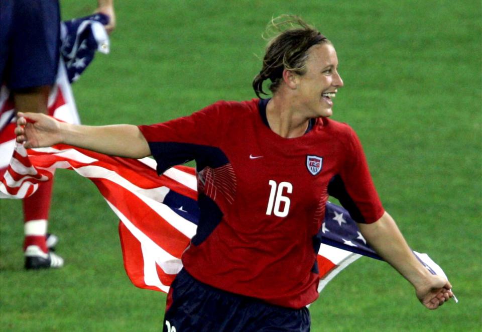 USA's Abby Wambach celebrates the victory against Brazil at the end of the gold medal match at the 2004 Athens Olympics at the Karaiskaki stadium in Athens, Greece.