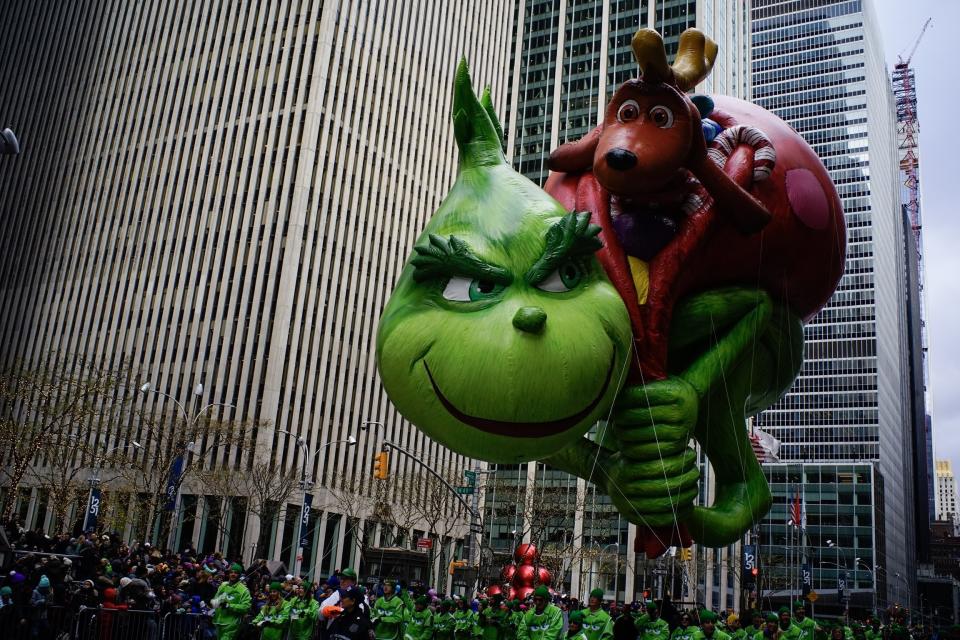 The Grinch balloon floats down Sixth Avenue during the Macy's Thanksgiving Day Parade, Thursday, Nov. 28, 2019, in New York. (AP Photo/Eduardo Munoz Alvarez)