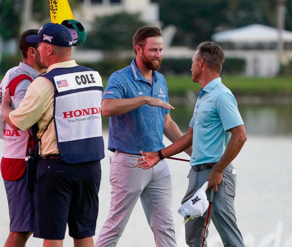 Eric Cole congratulates Chris Kirk after his playoff victory in the Honda Classic at PGA National Resort & Spa on Sunday, February 26, 2023, in Palm Beach Gardens, FL.