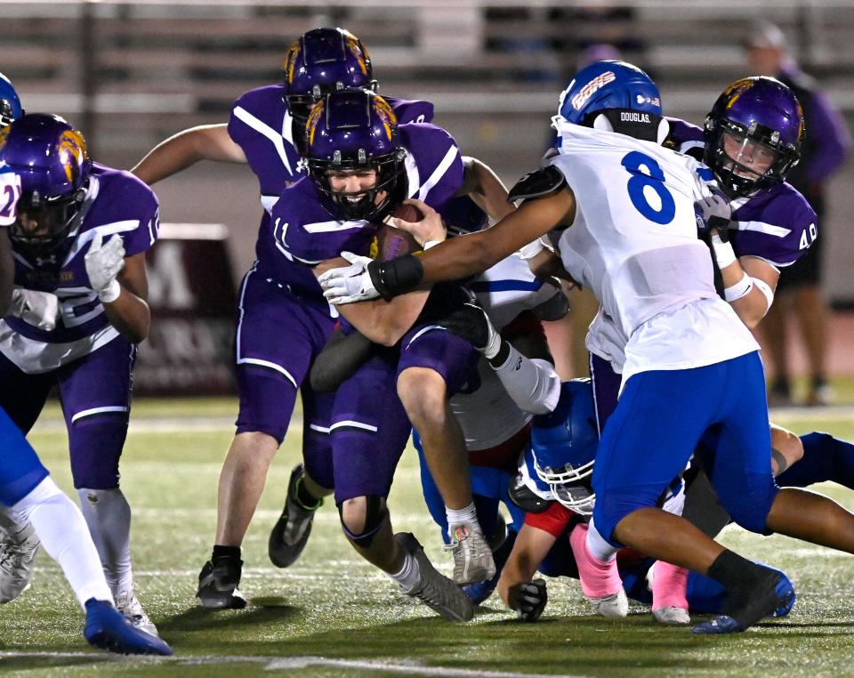 Wylie quarterback Bear Meng pushes through as he scrambles with the ball against Palo Duro during Friday’s game in Abilene Oct. 27, 2023. Final score was 33-16, Wylie.