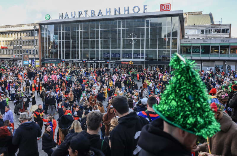 Shrouded in tradition, Cologne's Carnival is one of the biggest street parties in Europe. Here, revellers are crowded in front of the main train station. Oliver Berg/dpa