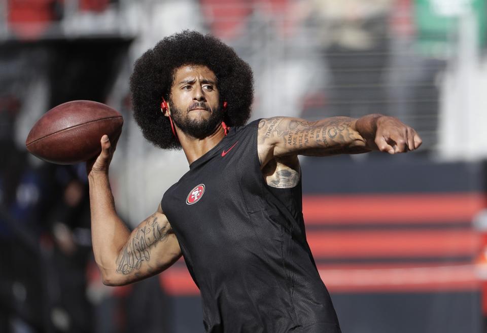 San Francisco quarterback Colin Kaepernick warms up before a game against Arizona.