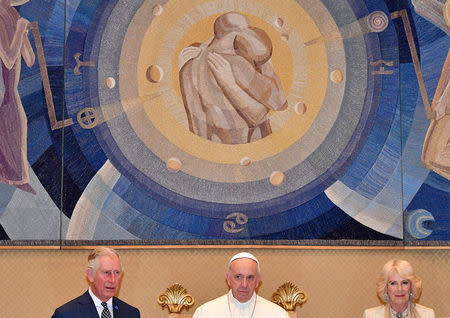 Pope Francis meets Britain's Prince Charles and his wife Camilla, Duchess of Cornwall, as they arrive for a private audience at the Vatican, April 4, 2017. REUTERS/Vincenzo Pinto/Pool