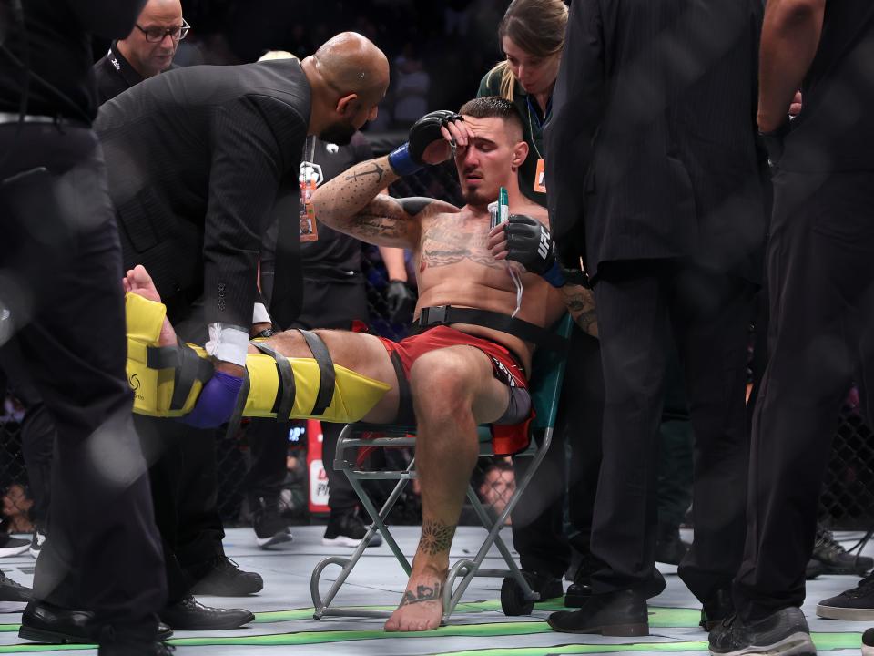 Tom Aspinall injured his knee just 15 seconds into the main event (Getty Images)