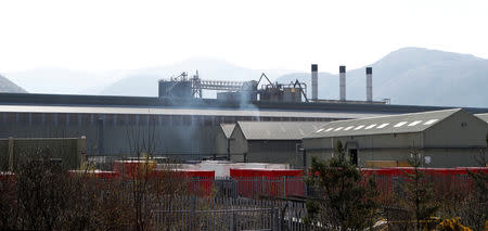 FILE PHOTO: A row of red-painted containers at the Lochaber aluminium smelter site, which is owned by companies controlled by Sanjeev Gupta's GFG Alliance, in Fort William, Scotland, Britain April 17, 2019. REUTERS/Russell Cheyne/File Photo