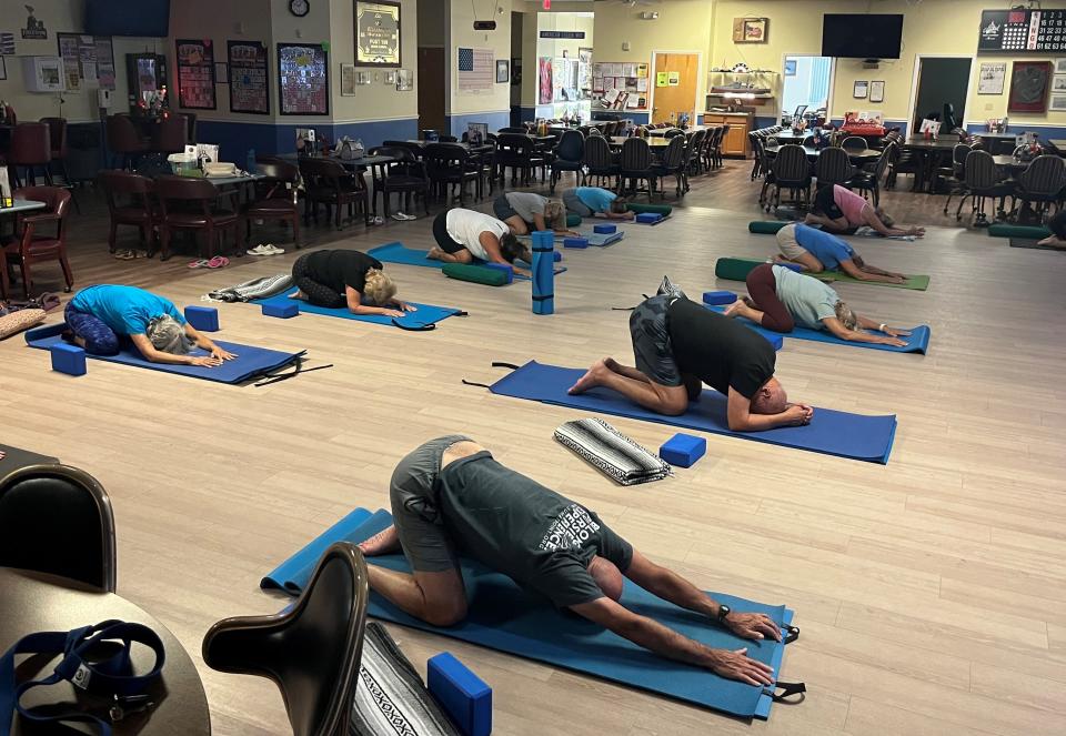 Veterans and family members practice yoga through Operation Warrior Resolution to alleviate stress and calm the nervous system. The nonprofit recently received a $23,300 grant from the Community Foundation of Sarasota County through the Suncoast Disaster Recovery Fund.