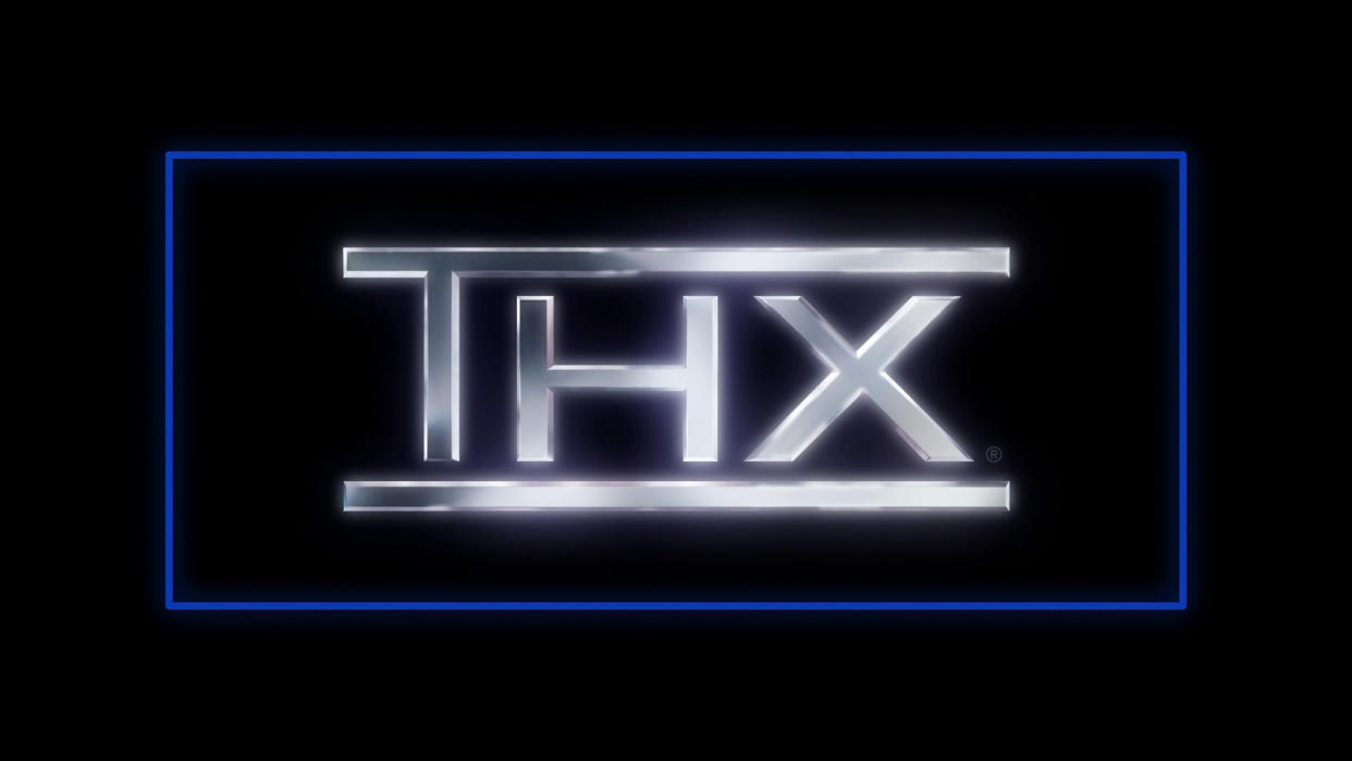  THX logo in metallic font on black background, surrounded by blue rectangular framing. 