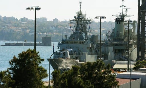 Australian Navy ships are seen at the Garden Island Naval Dockyard, near Sydney, on May 8. Australian Treasurer Wayne Swan is due to deliver the nation's toughest budget in 25 years, which is set to include deep cuts to spending on defence