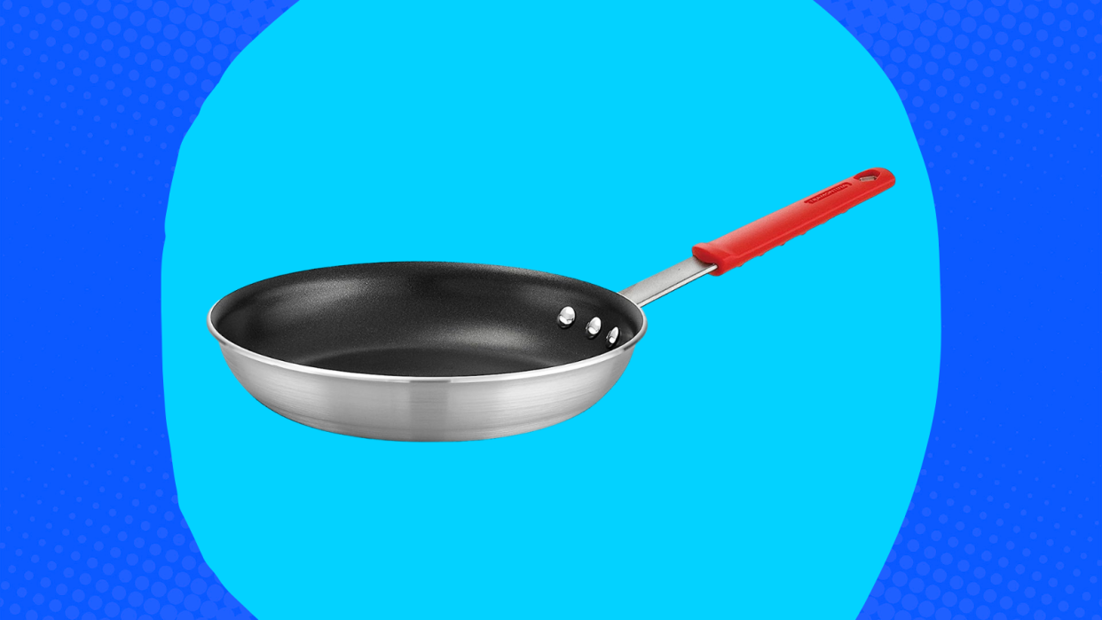 The Tramontina nonstick pan on a blue background