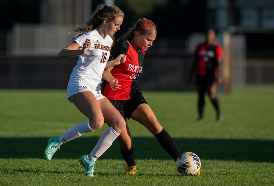 Brebeuf Jesuit Preparatory High School junior Rowan Pearl (16) and North Central High School senior Sara Jacobi (16) during the second half of a Marion County Girls’ Soccer championship game, Saturday, Sept. 24, 2022, at North Central High School.