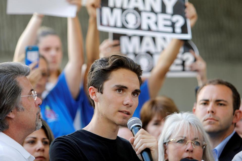 David Hogg, a senior at Marjory Stoneman Douglas High School, speaks at a rally calling for gun control: REUTERS