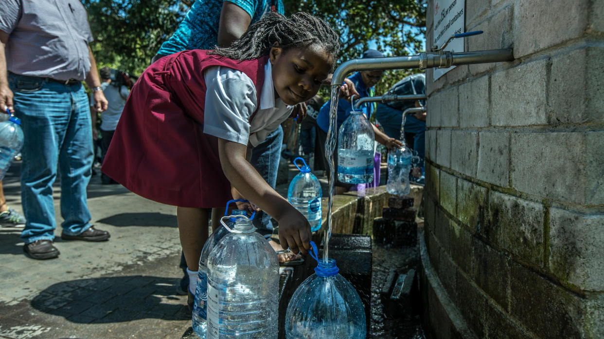 Cape Town residents queue to refill water bottles on Jan. 30, 2018.&nbsp;Diminishing water supplies may soon lead to the taps being turned off for the four million inhabitants of Cape Town. (Photo: Morgana Wingard via Getty Images)