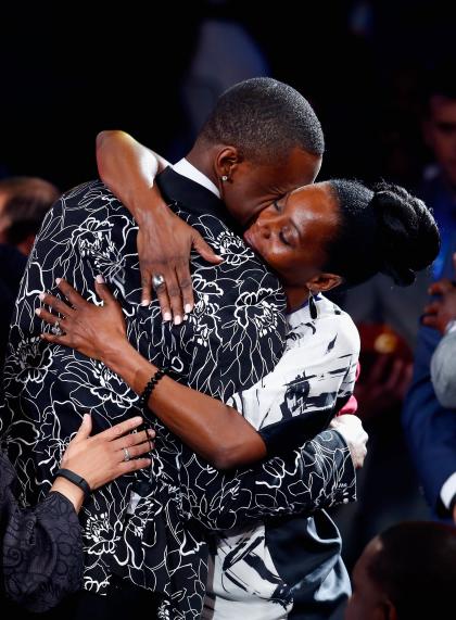 Andrew Wiggins hugs his mother after being drafted. (Getty)