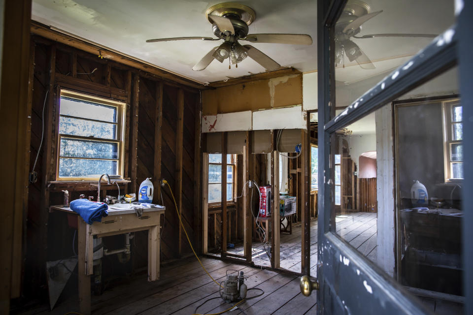 A view of the kitchen in the house of Ed Haggett that was damaged by 2023 flood in Montpelier, Vt, July 3, 2024.. Ed hasn't received reasonable compensation from the government and had to cover all reconstruction expenditures from her own savings. (AP Photo/ Dmitry Belyakov)