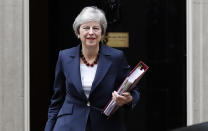 Britain's Prime Minister Theresa May leaves 10 Downing Street to attend the weekly Prime Ministers' Questions session in parliament, in London, Wednesday, Oct. 17, 2018. May will head to Brussels later Wednesday for a meeting with European Union leaders for what is widely billed as a "moment of truth" Brexit summit. (AP Photo/Frank Augstein)