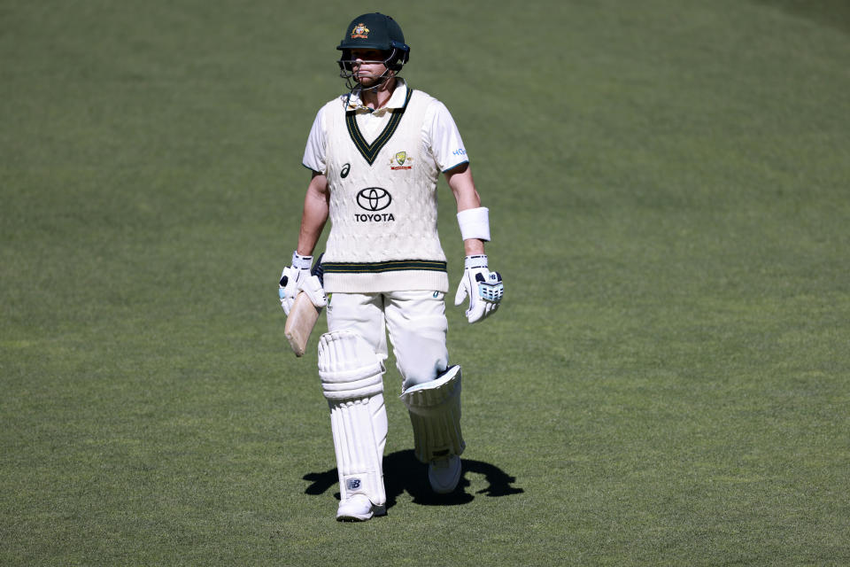 Australia's Steve Smith walks off after he was caught out by the West Indies on the first day of their cricket test match in Adelaide, Australia, Wednesday, Jan. 17, 2024. (AP Photo/James Elsby)