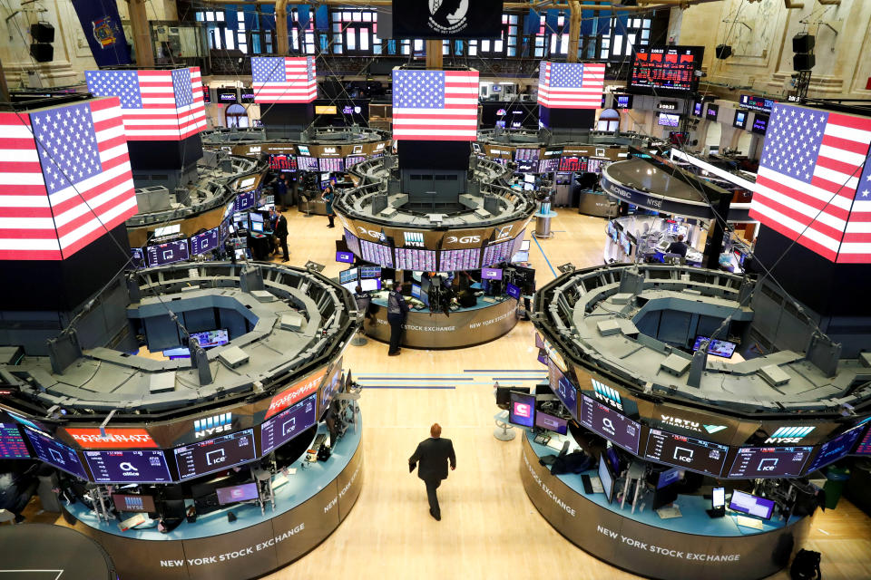 Traders work on the floor of the New York Stock Exchange