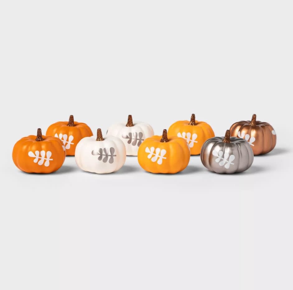 You can leave these out around the house for the ghouls and ghosts to get. <a href="https://goto.target.com/c/2055067/81938/2092?u=https%3A%2F%2Fwww.target.com%2Fp%2F8ct-harvest-mini-decorative-pumpkin-with-leaves-spritz-8482%2F-%2FA-78829761%23lnk%3Dsametab&amp;subid1=5&amp;subid2=halloween&amp;subid3=decor" target="_blank" rel="noopener noreferrer">Find the set for $6 at Target</a>.