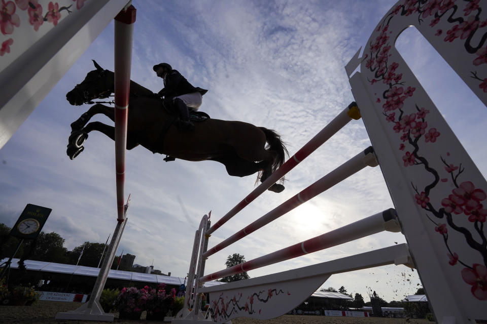<p>Ben Maher riding Explosion W competes in the Pearl Stakes at the Royal Windsor Horse Show, Windsor. Picture date: Friday July 2, 2021.</p>
