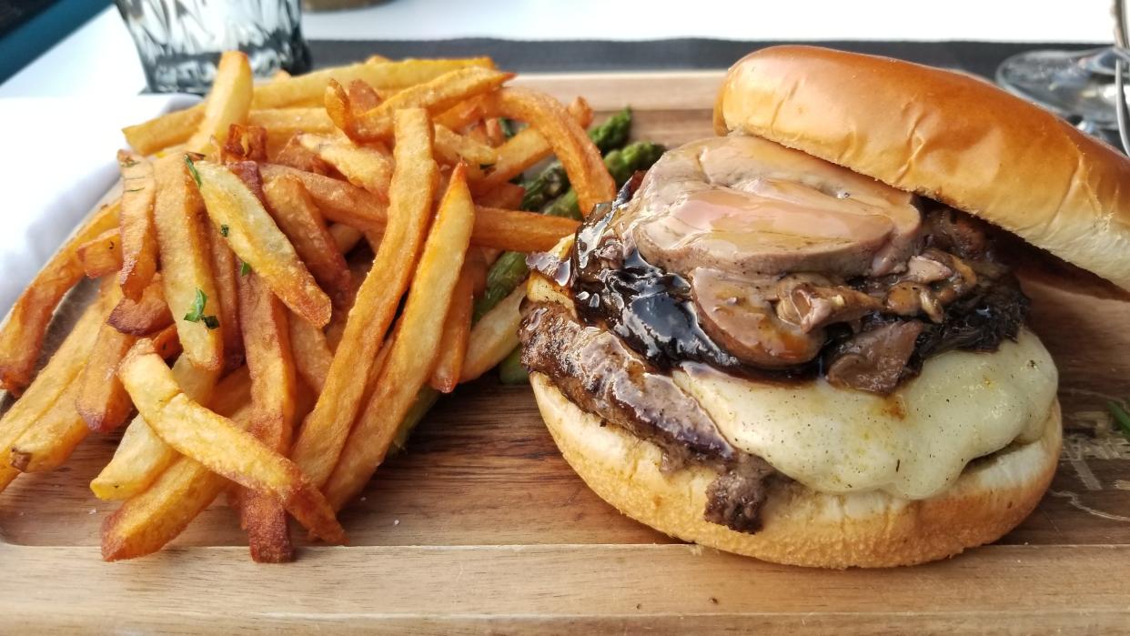 Château 13 in downtown Bradenton, known for European-style cuisine such as The Louis XIII Burger pictured here, was among the local establishments that made Yelp's first-ever Top 100 Florida Restaurants list. Seven Sarasota-Manatee restaurants were included.