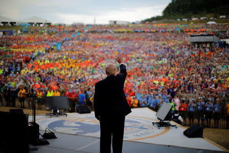 President Donald Trump waves after delivering remarks at the 2017 National Scout Jamboree in Summit Bechtel National Scout Reserve, West Virginia. REUTERS/Carlos Barria