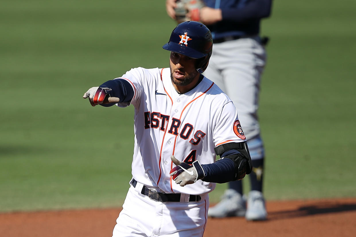 SAN DIEGO, CALIFORNIA - OCTOBER 15: George Springer #4 of the Houston Astros rcelebrates a solo home run against John Curtiss #84 of the Tampa Bay Rays during the first inning in Game Five of the American League Championship Series at PETCO Park on October 15, 2020 in San Diego, California. (Photo by Sean M. Haffey/Getty Images)