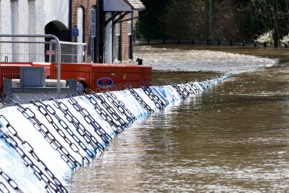 Temporary barriers have been overwhelmed by flood water in Bewdley (Getty Images)