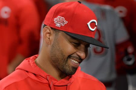 FILE PHOTO: Apr 18, 2019; San Diego, CA, USA; Cincinnati Reds left fielder Matt Kemp (27) smiles in the dugout during the ninth inning against the San Diego Padres at Petco Park. Mandatory Credit: Jake Roth-USA TODAY Sports - 12557276