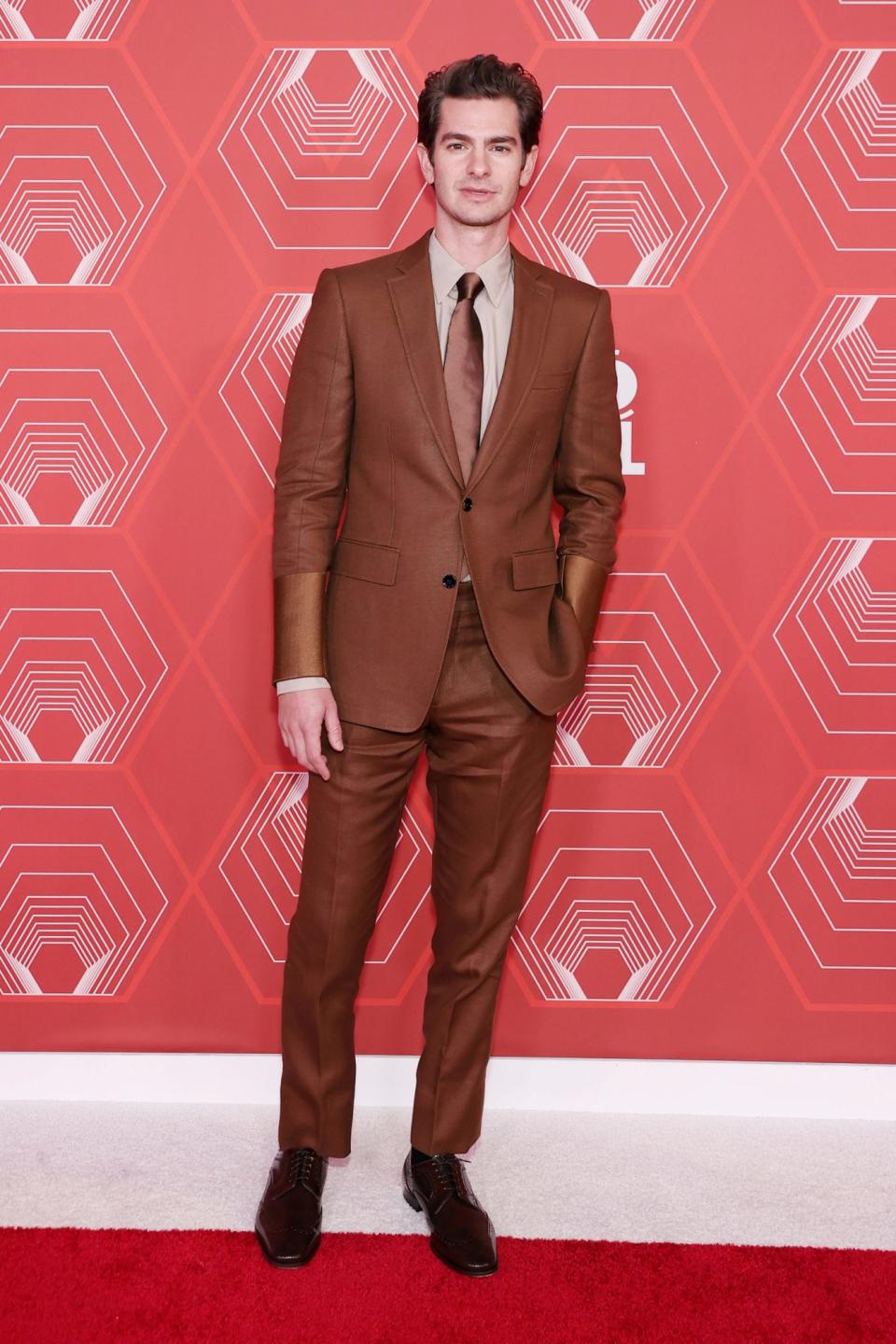 <p>Actor Andrew Garfield wore a brown suit on the red carpet of the 2021 Tony Awards. </p>