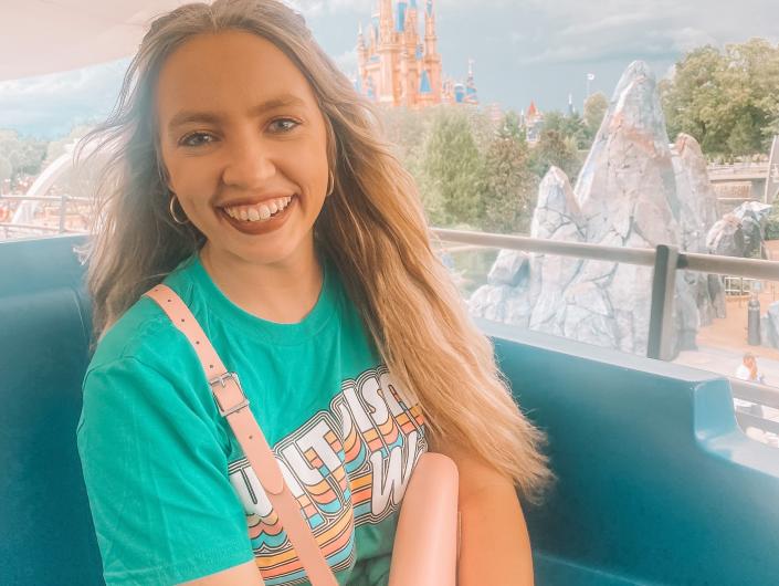 kayleigh price riding the people mover at magic kingdom in disney world