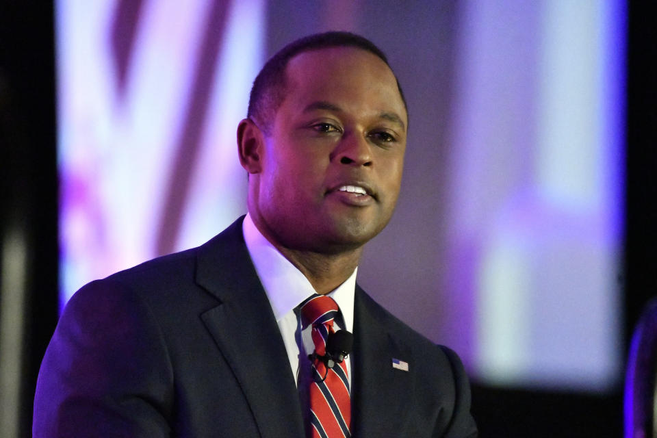 Kentucky Attorney General Daniel Cameron responds to a question from a moderator during the Gubernatorial Forum at the 2023 Kentucky Chamber of Commerce annual meeting dinner in Louisville, Ky., Wednesday, Sept. 20, 2023. (AP Photo/Timothy D. Easley)