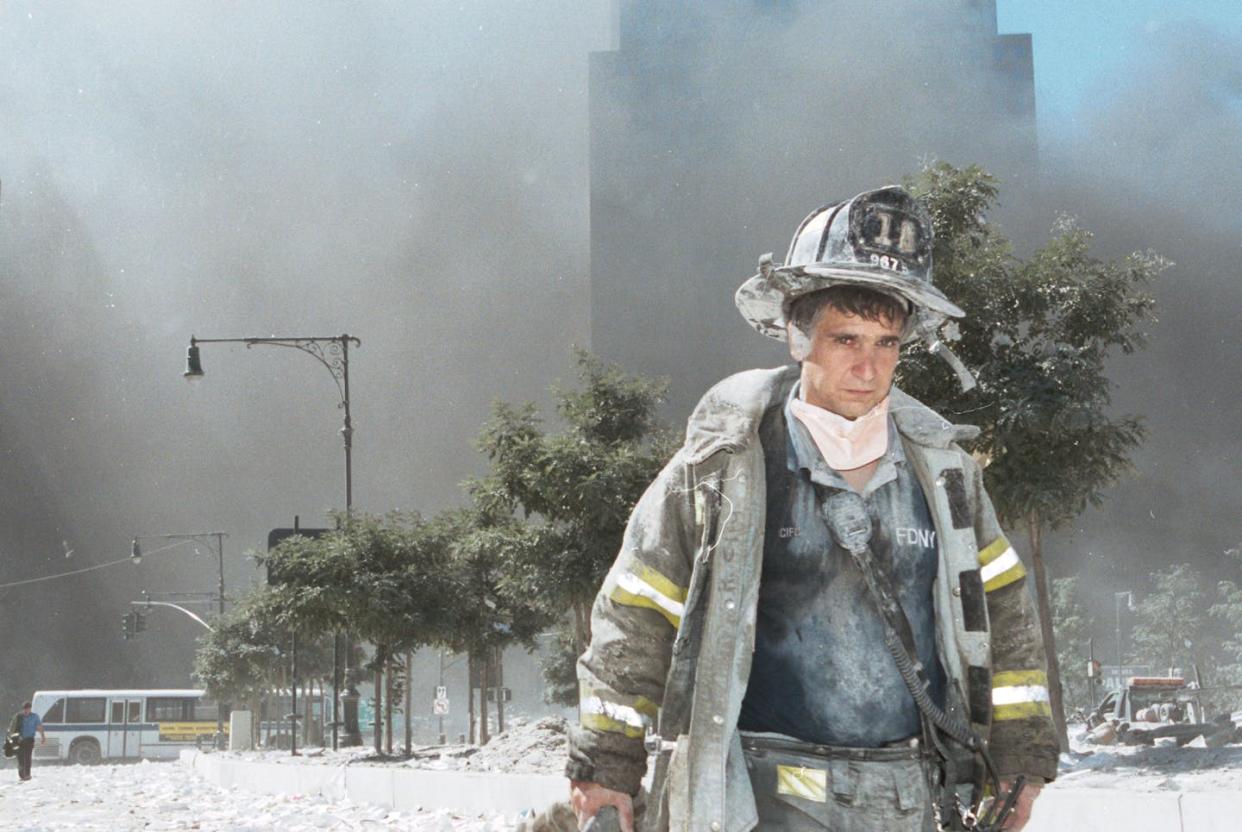 Toxic dust hung in the air around ground zero for more than three months following the 9/11 terrorist attacks. <a href="https://www.gettyimages.com/detail/news-photo/an-unidentified-new-york-city-firefighter-walks-away-from-news-photo/1372804?adppopup=true" rel="nofollow noopener" target="_blank" data-ylk="slk:Anthony Correia/Getty Images;elm:context_link;itc:0;sec:content-canvas" class="link ">Anthony Correia/Getty Images</a>