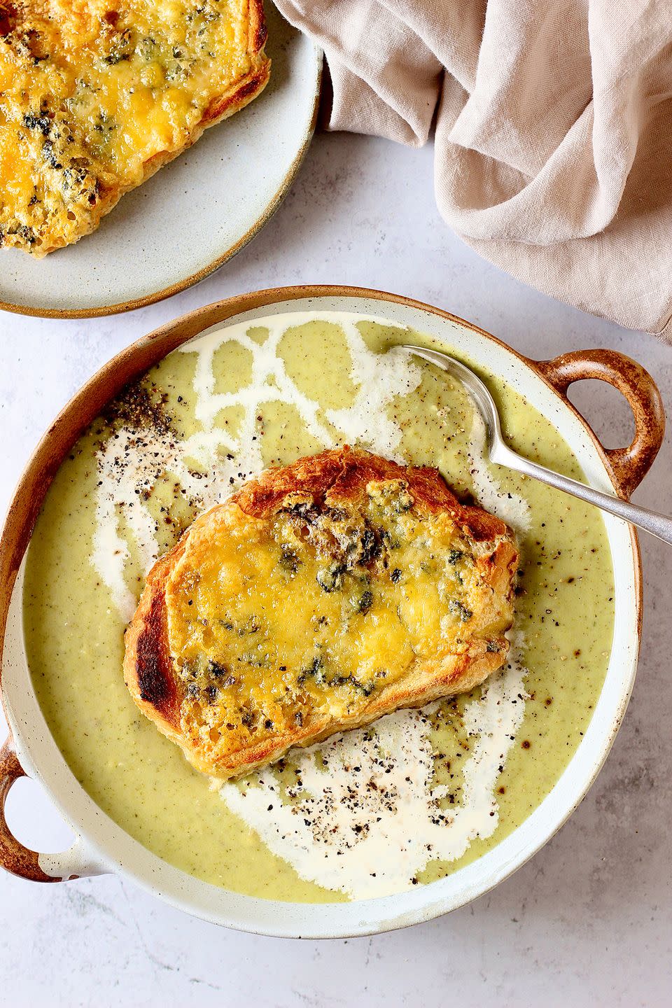 <p>This delicious broccoli and stilton <a href="https://www.delish.com/uk/cooking/recipes/g33443935/best-soup-recipes/" rel="nofollow noopener" target="_blank" data-ylk="slk:soup;elm:context_link;itc:0;sec:content-canvas" class="link ">soup</a> is a classic for a reason. The flavour of creamy broccoli works perfectly with tangy and savoury <a href="https://www.delish.com/uk/cooking/recipes/g33021017/halloumi/" rel="nofollow noopener" target="_blank" data-ylk="slk:Stilton;elm:context_link;itc:0;sec:content-canvas" class="link ">Stilton</a>. You could also use a different cheese such as cheddar on the toasts, if you prefer.</p><p>Get the <a href="https://www.delish.com/uk/cooking/recipes/a37067353/broccoli-stilton-soup/" rel="nofollow noopener" target="_blank" data-ylk="slk:Broccoli & Stilton Soup;elm:context_link;itc:0;sec:content-canvas" class="link ">Broccoli & Stilton Soup</a> recipe.</p>