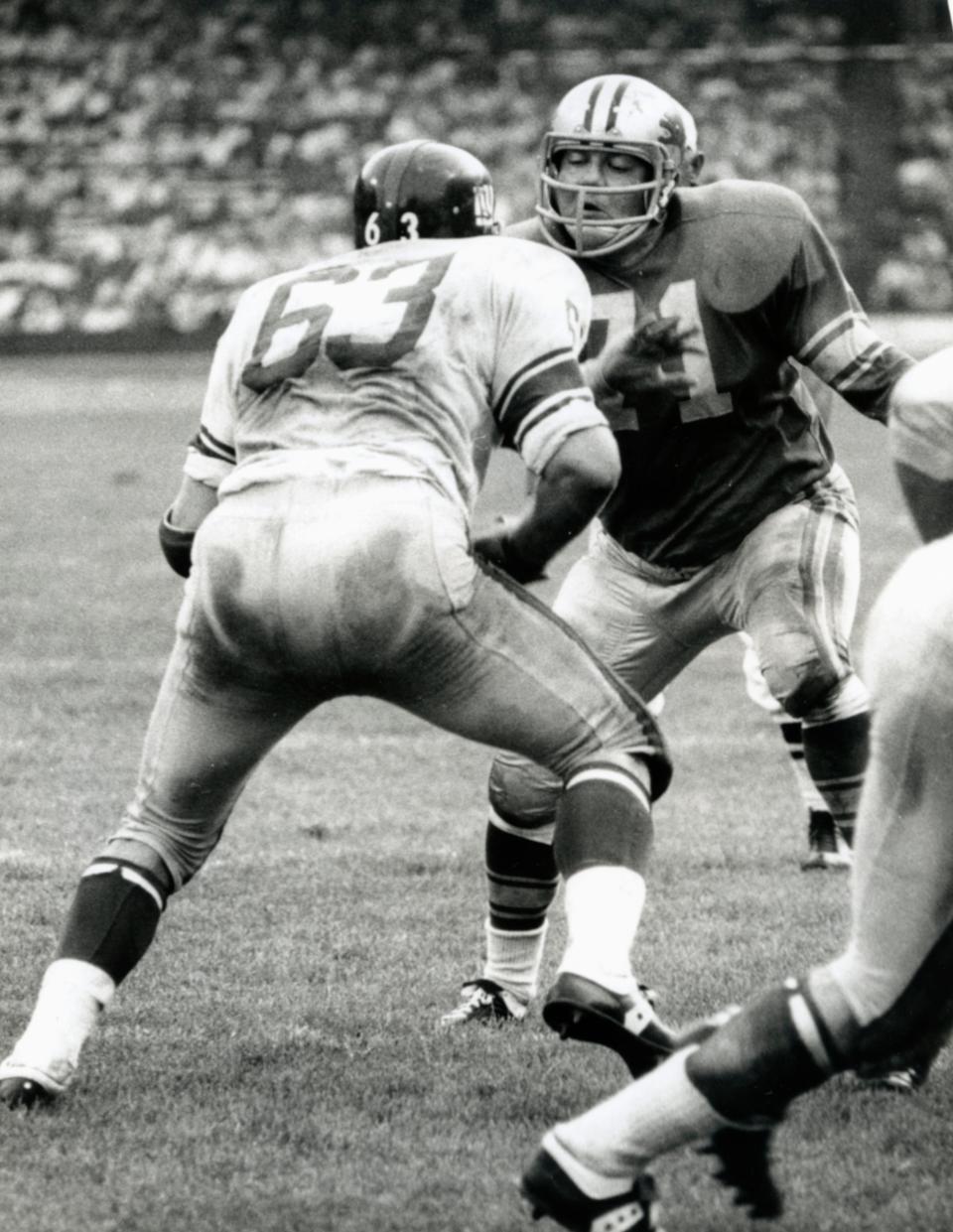Oct 4, 1964; Detroit, MI, USA; FILE PHOTO; Detroit Lions defensive tackle Alex Karras (71) in action against the New York Giants at Tigers Stadium. The Lions beat the Giants 26-3. Mandatory Credit: Malcolm Emmons-USA TODAY Sports