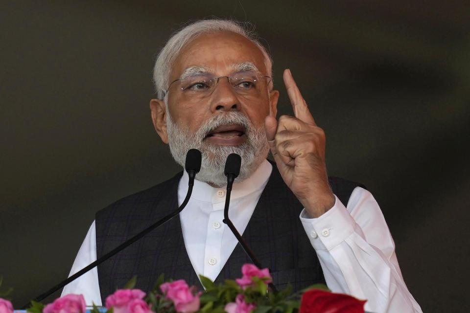 FILE- Indian Prime Minister Narendra Modi speaks at a rally in Mumbai, India, Thursday, Jan. 19, 2023. India’s Prime Minister Narendra Modi on Wednesday, Nov. 22, 2023 welcomed a cease-fire that's expected to enable the release of dozens of hostages taken by Hamas and urged leaders of the top rich and developing nations to work together to ensure the Israel-Hamas war doesn't expand in the region. (AP Photo/Rafiq Maqbool, File)