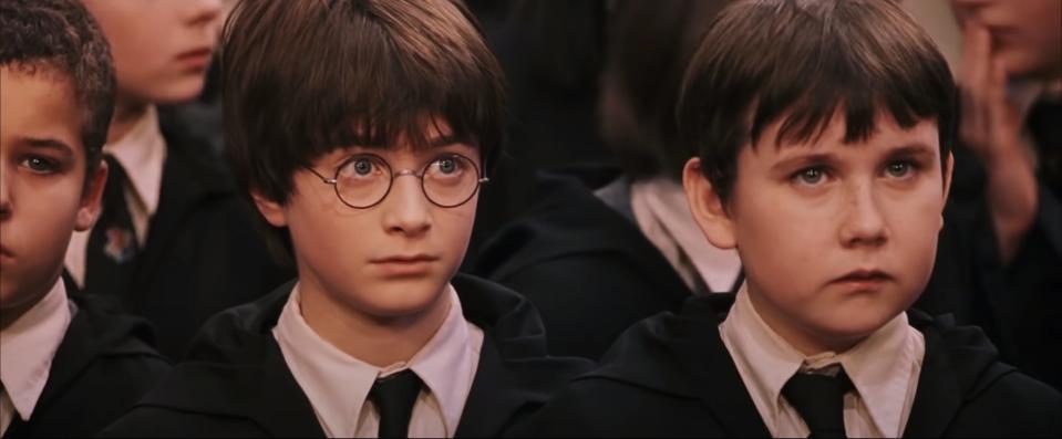 Daniel Radcliffe as Harry Potter and Matthew Lewis as Neville Longbottom in "Harry Potter and the Sorcerer's Stone."