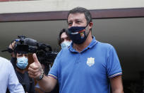 Right-wing opposition leader Matteo Salvini leaves a polling station, in Milan, Italy, Monday, Sept. 21, 2020. On Sunday and Monday Italians are called to vote nationwide in a referendum to confirm a historical change to the country's constitution to drastically reduce the number of Members of Parliament from 945 to 600. Eighteen million of Italian citizens will also vote on Sunday and Monday to renew local governors in seven regions, along with mayors in approximately 1,000 cities. (AP Photo/Antonio Calanni)