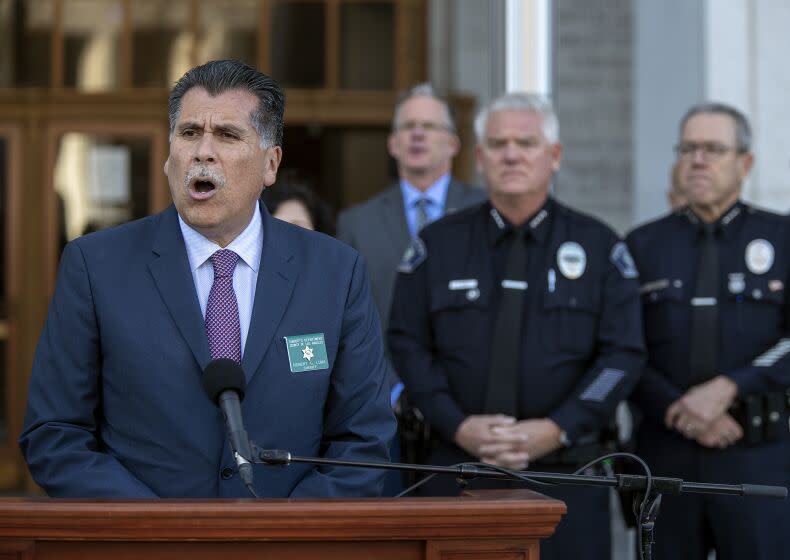 LOS ANGELES, CA-JANUARY 23, 2023:Los Angeles County Sheriff Robert Luna addresses the media, with an update on the Mass Shooting in Monterey Park, in front of the Hall of Justice in downtown Los Angeles. At far right is LAPD Chief Michel Moore and 2nd from right is Monterey Park Police Chief Steve Wiese. (Mel Melcon / Los Angeles Times)
