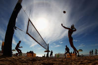 MANLY, AUSTRALIA - MARCH 31: A player spikes the ball during day two of the National Beach Volleyball Series at Manly Beach on March 31, 2012 in Manly, Australia. (Photo by Ryan Pierse/Getty Images)